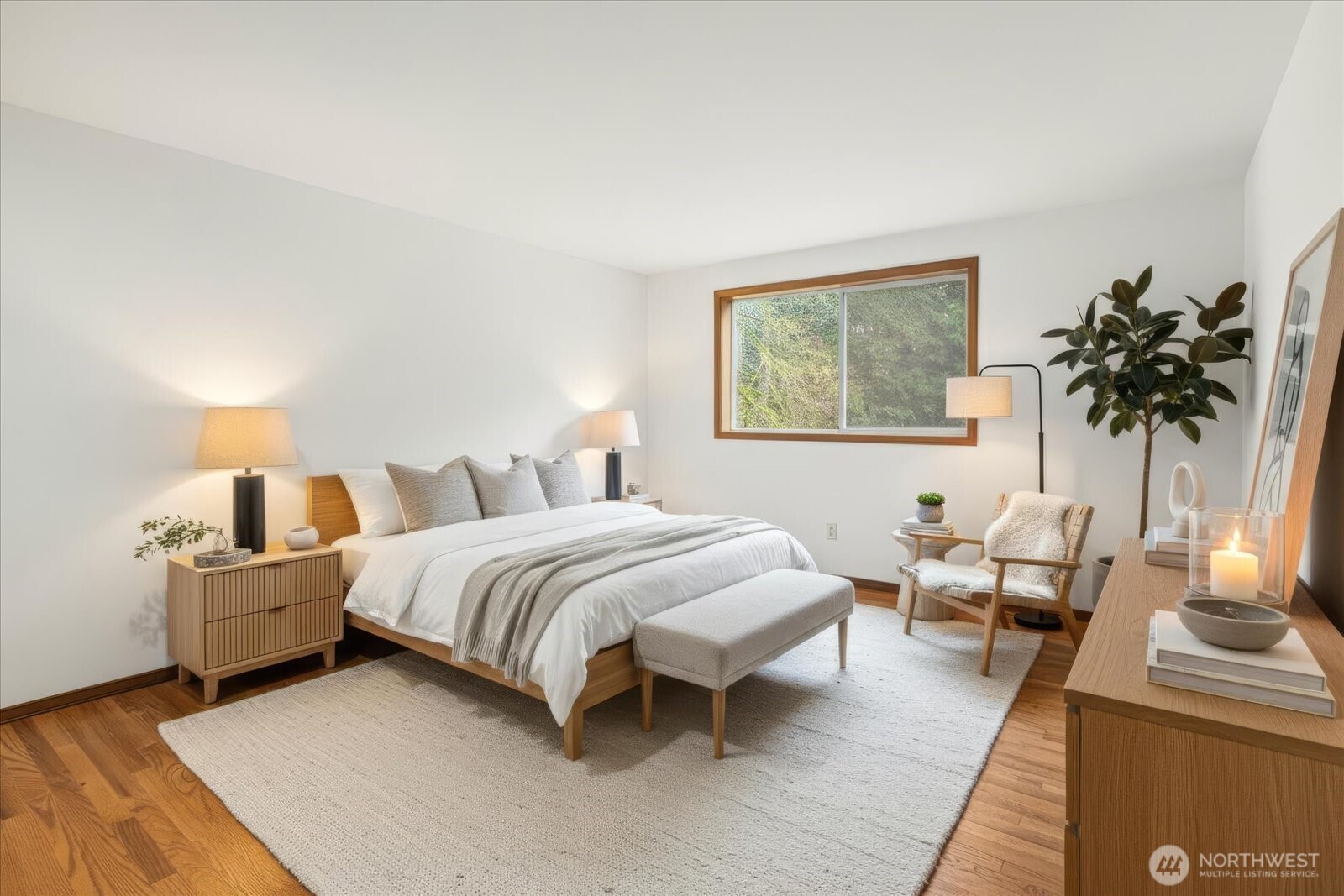18721 Northeast 133rd Street Redmond, WA 98052 - Photo 19 of 39 a spacious bedroom with a bed a couch and potted plant