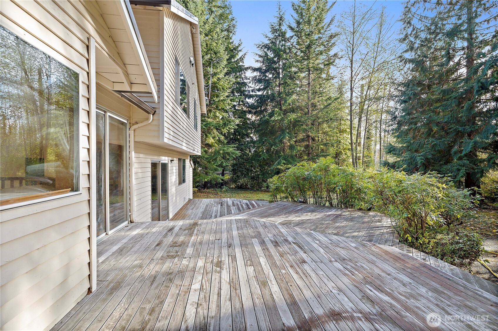 18721 Northeast 133rd Street Redmond, WA 98052 - Photo 29 of 39 a view of a house with a backyard