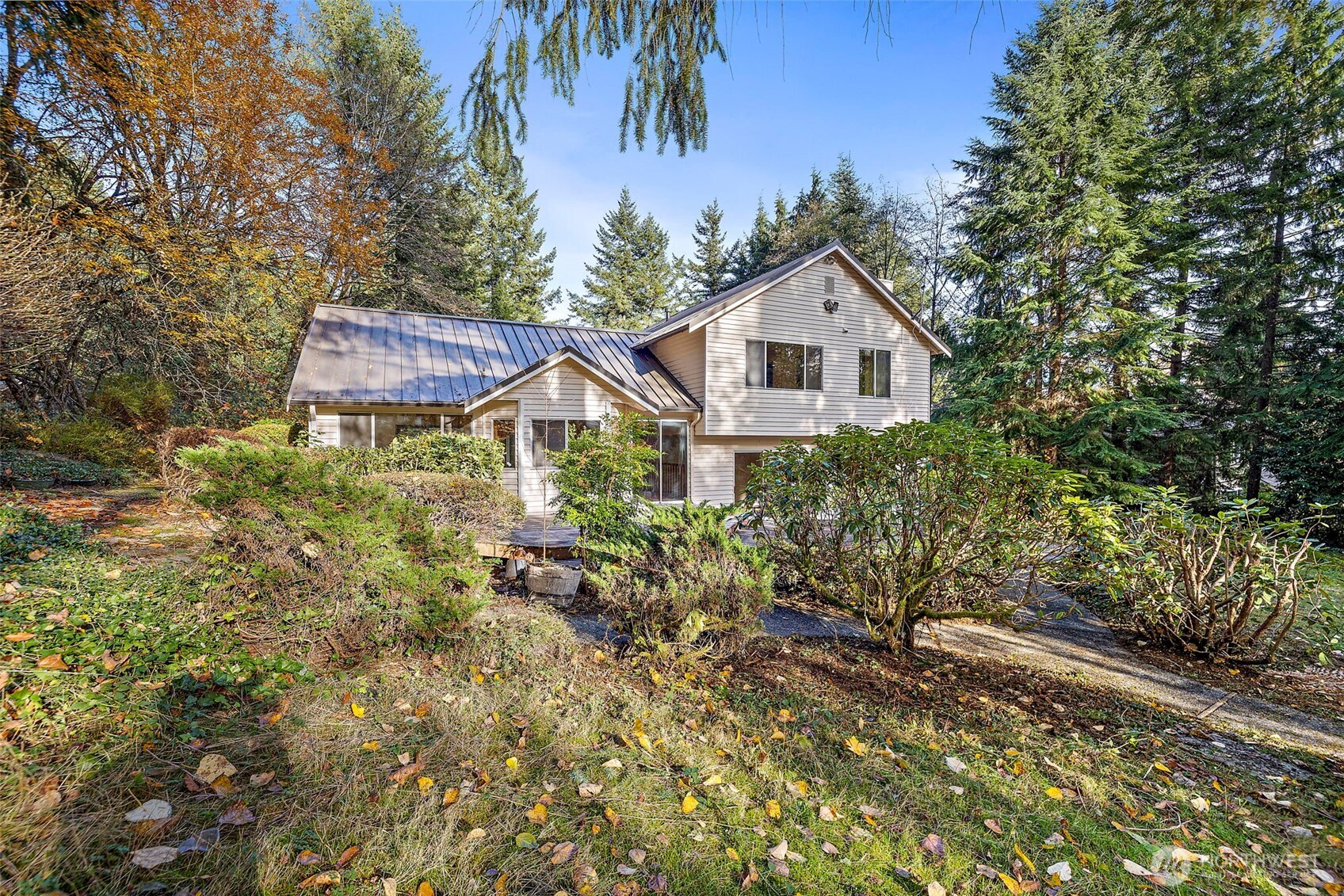 18721 Northeast 133rd Street Redmond, WA 98052 - Photo 33 of 39 a house with green field in front of it