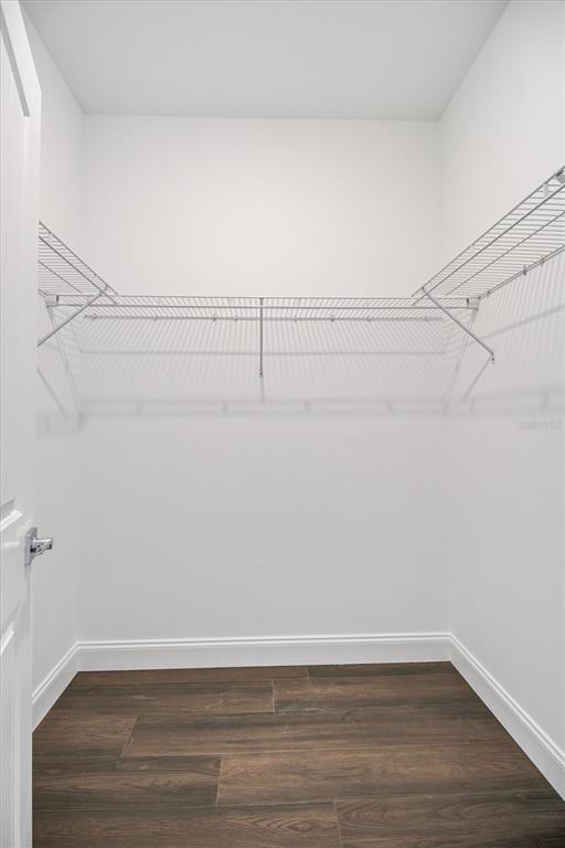 52 Pershing Lane Palm Coast, FL 32164 - Photo 16 of 37 a view of a room with racks on the wall