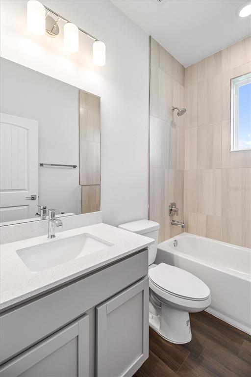 52 Pershing Lane Palm Coast, FL 32164 - Photo 22 of 37 a bathroom with a sink a toilet and shower