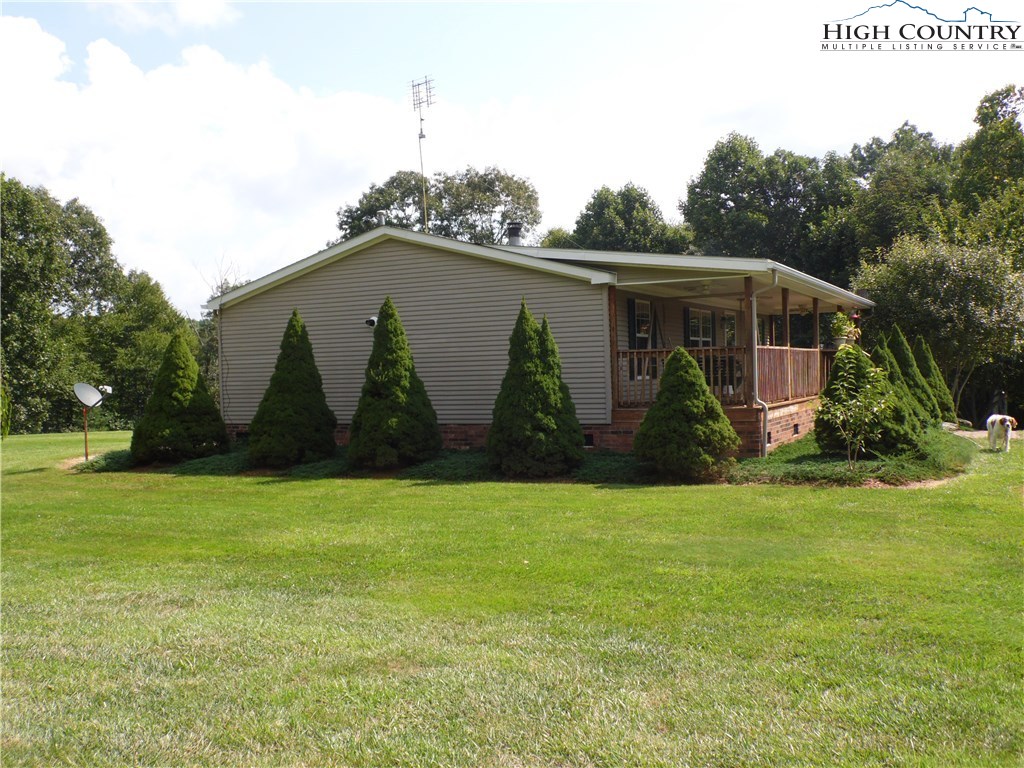 528 Stewart Road Ennice, NC 28623 - Photo 32 of 46 a view of outdoor with garden