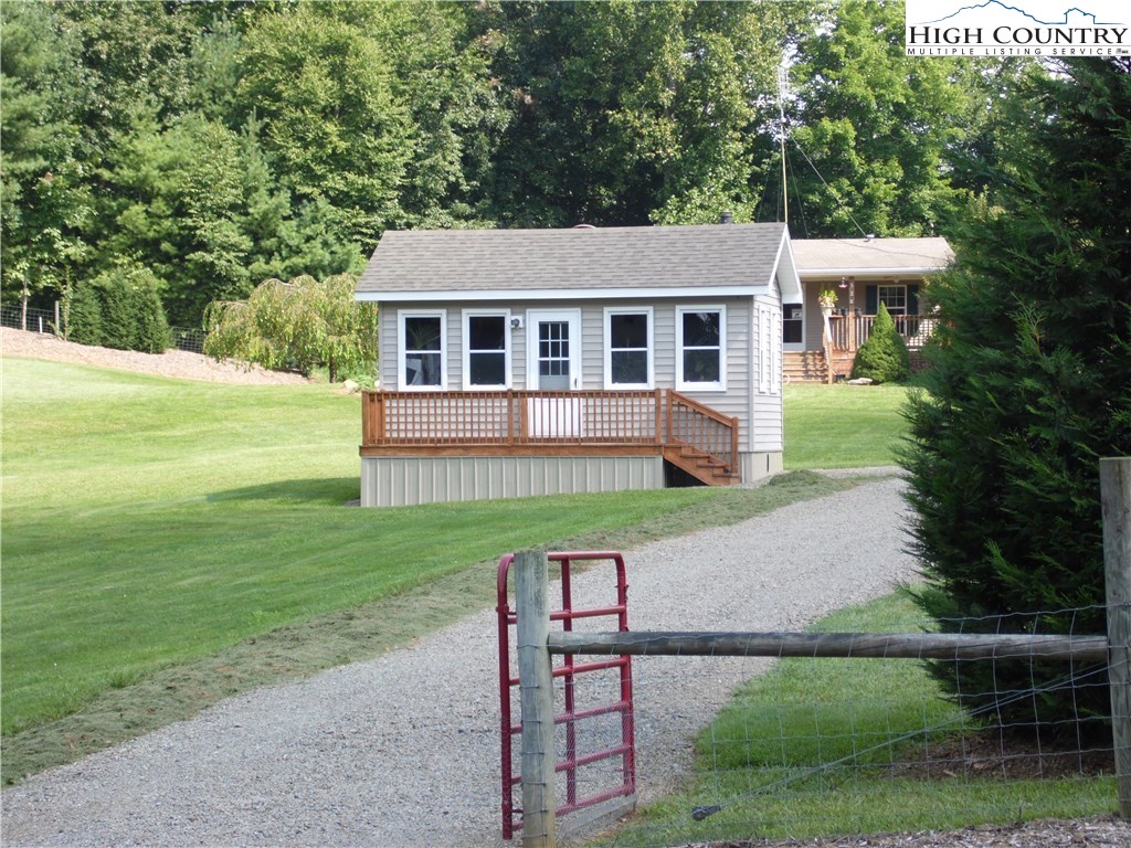 528 Stewart Road Ennice, NC 28623 - Photo 33 of 46 a front view of a house with a yard