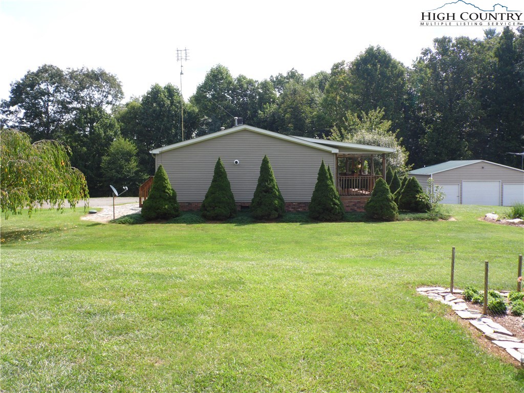 528 Stewart Road Ennice, NC 28623 - Photo 34 of 46 a view of outdoor space yard and patio