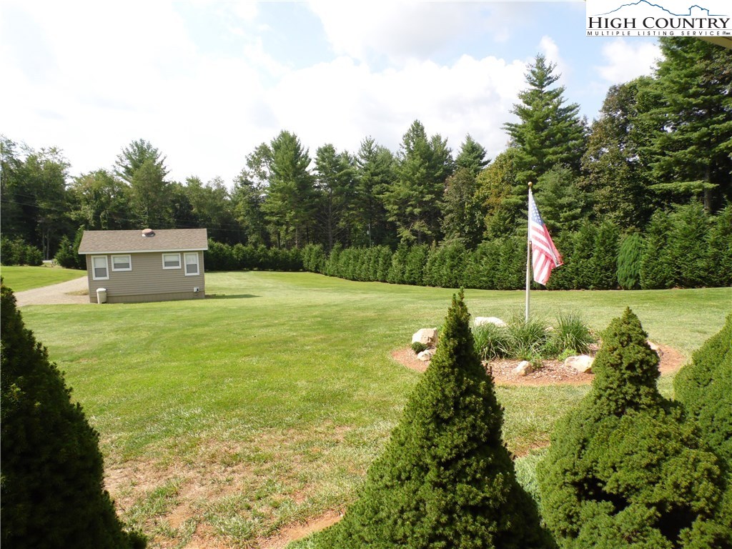 528 Stewart Road Ennice, NC 28623 - Photo 38 of 46 a view of a field with an trees