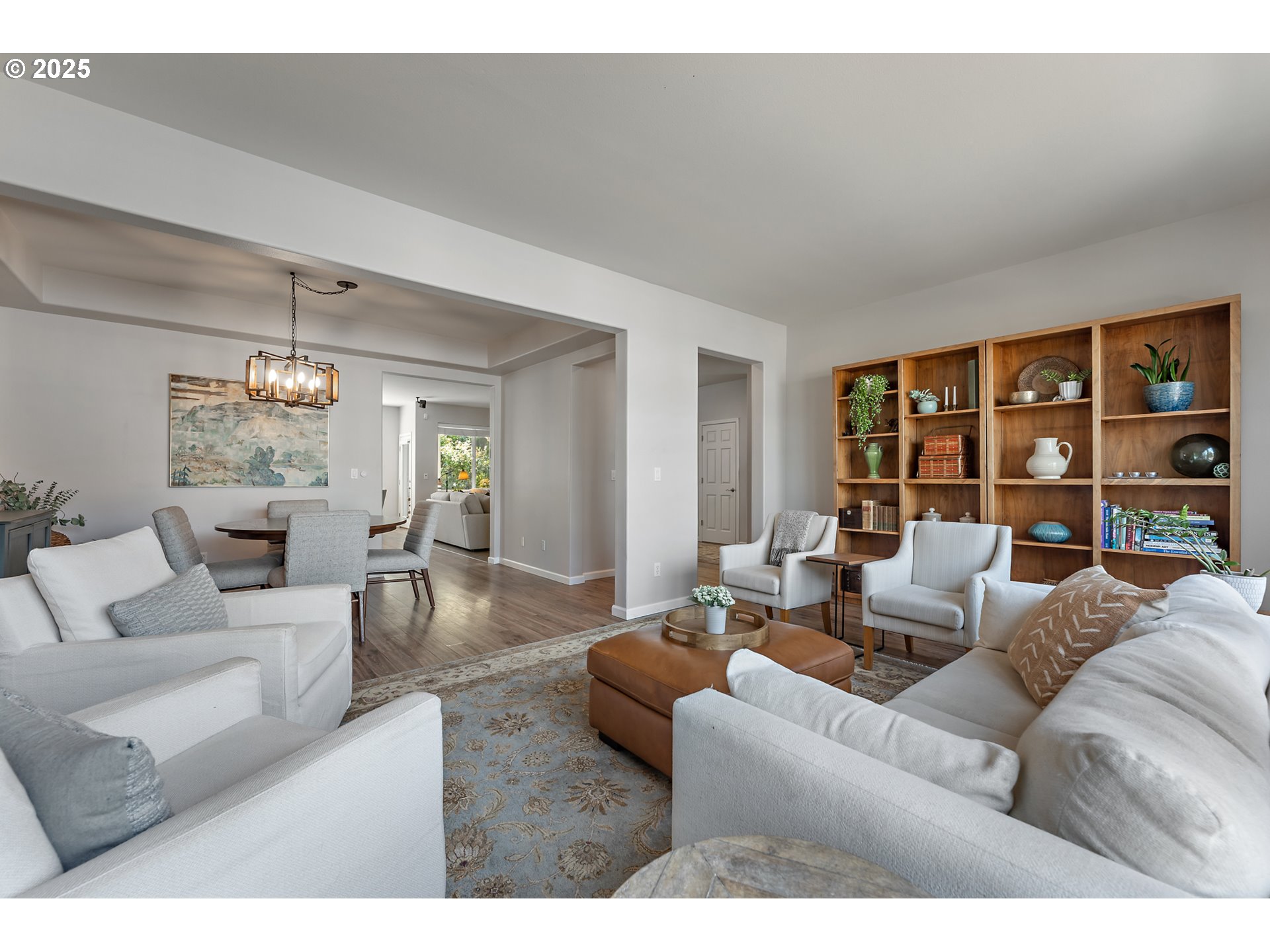 15702 Southwest Snowy Owl Lane Beaverton, OR 97007 - Photo 22 of 44 a living room with furniture and a large window