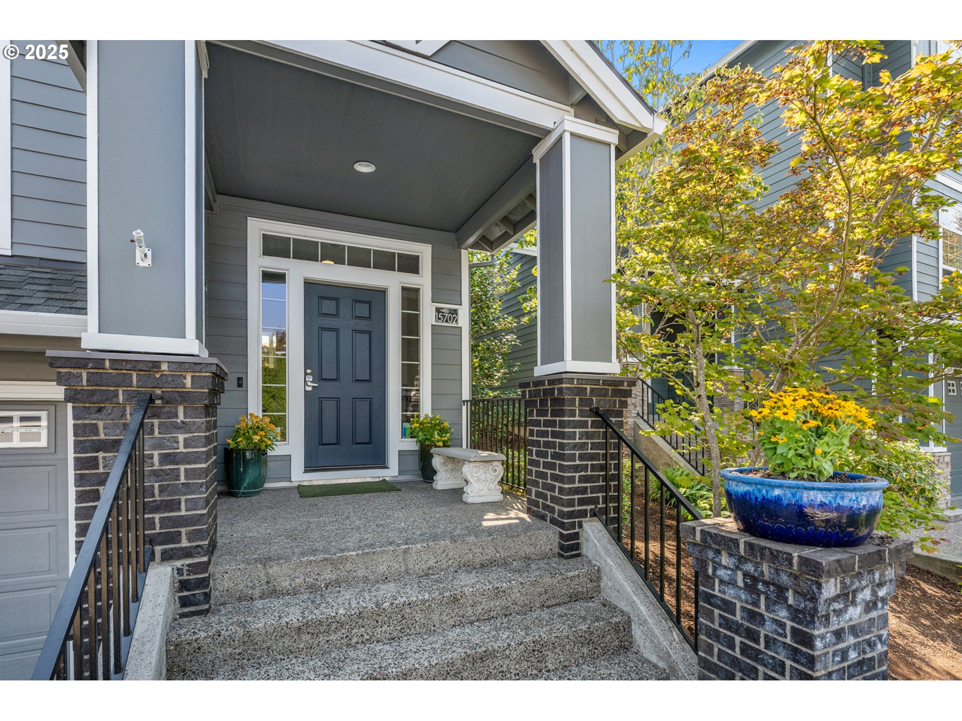 15702 Southwest Snowy Owl Lane Beaverton, OR 97007 - Photo 3 of 44 a view of entryway with a wooden door