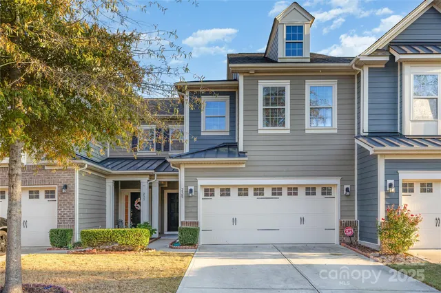 a kitchen with stainless steel appliances granite countertop a stove and a microwave