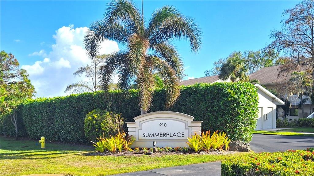 910 Vanderbilt Beach Road, Unit 416E Naples, FL 34108 - Photo 16 of 16 a view of a swimming pool with a garden