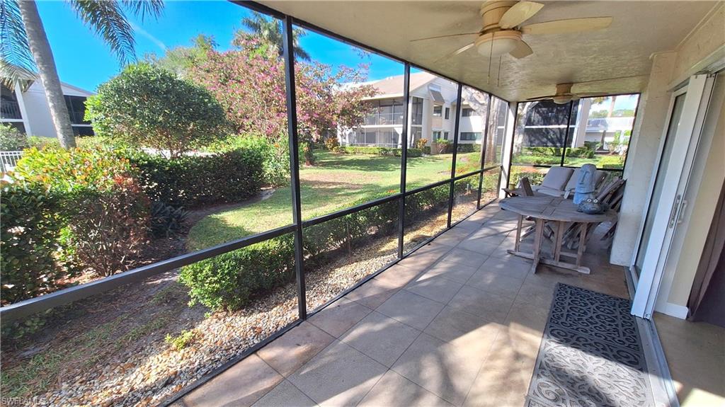 910 Vanderbilt Beach Road, Unit 416E Naples, FL 34108 - Photo 9 of 16 a view of balcony with wooden floor