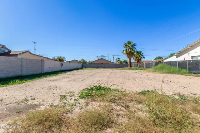 a view of a backyard of a house