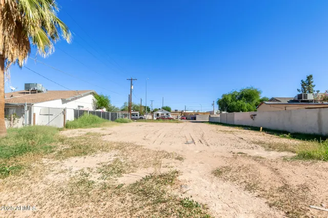 a view of a backyard of a house