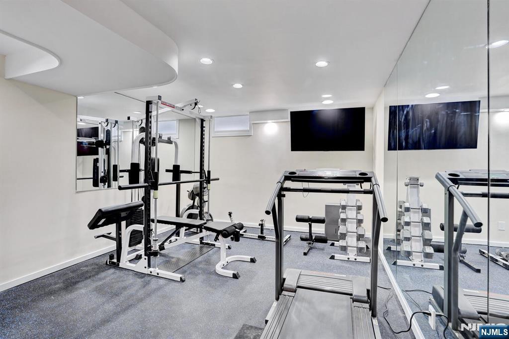 4 Summertree Way Montvale, NJ 07645 - Photo 33 of 50 a view of a room with lots of chairs and mirrors