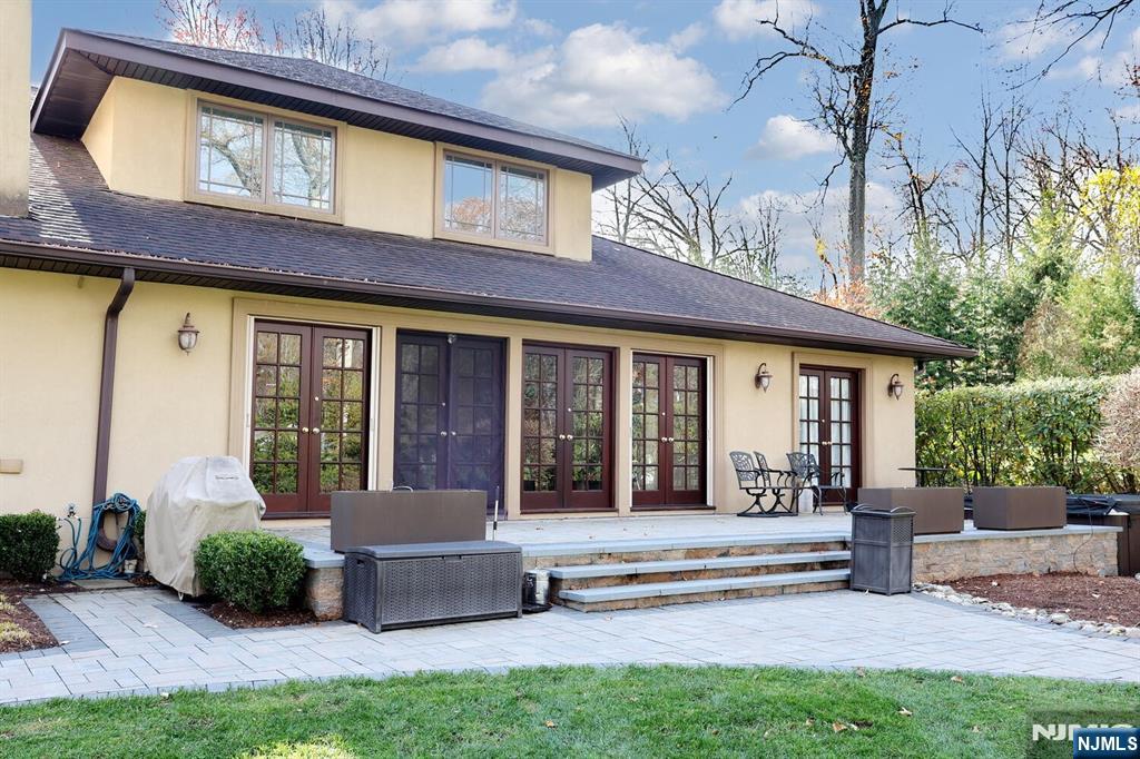 4 Summertree Way Montvale, NJ 07645 - Photo 37 of 50 a view of a house with a small yard and plants