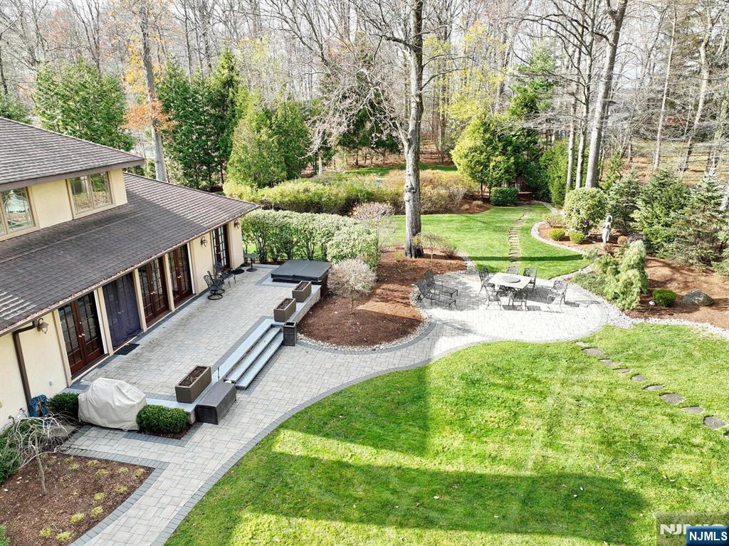4 Summertree Way Montvale, NJ 07645 - Photo 45 of 50 a view of backyard with swimming pool and patio