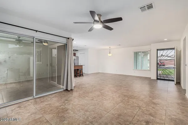 a view of an empty room and window