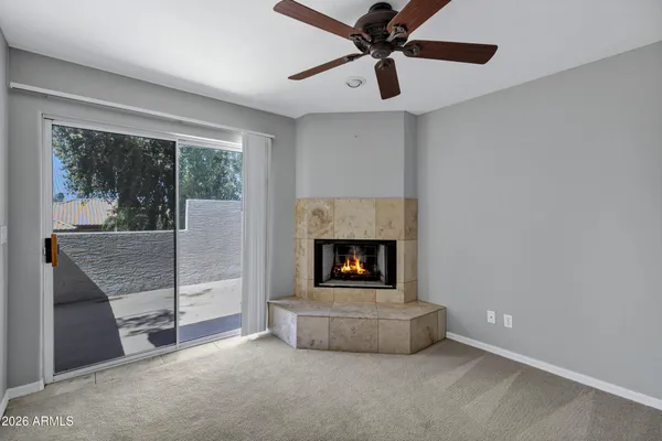 a view of a house with a yard and plant