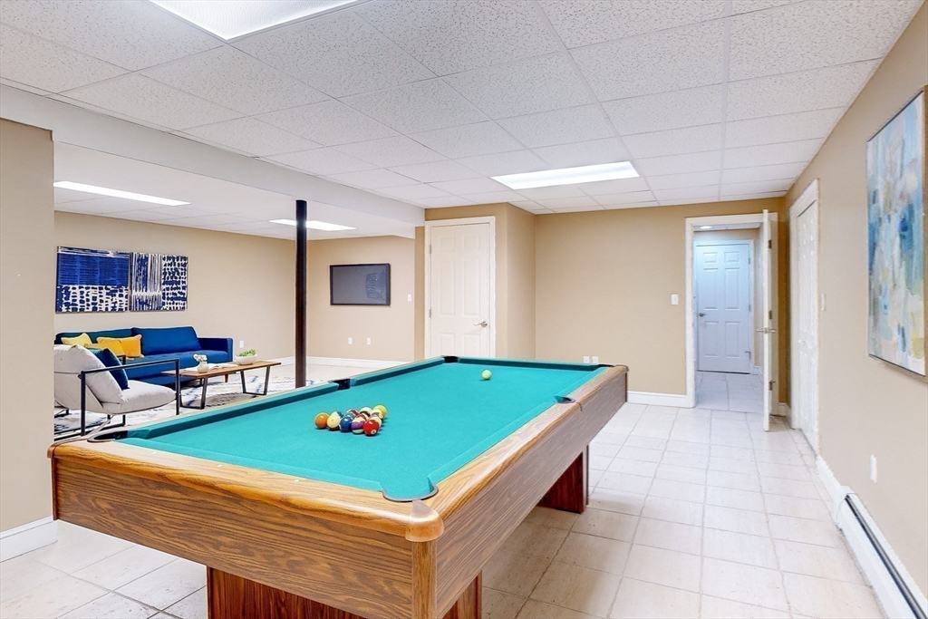99 Ridge Street Winchester, MA 01890 - Photo 30 of 40 a room with pool table and windows