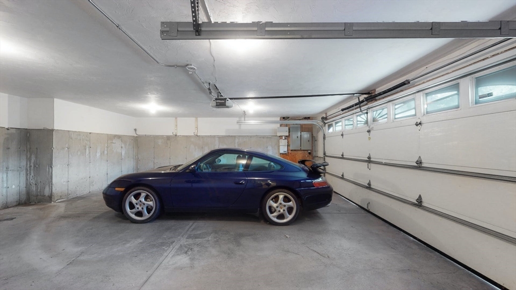 99 Ridge Street Winchester, MA 01890 - Photo 33 of 40 a view of a car in a garage