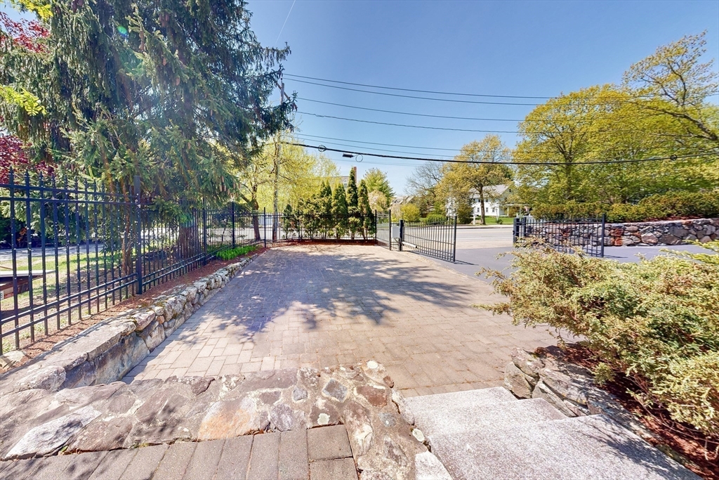 99 Ridge Street Winchester, MA 01890 - Photo 34 of 40 a view of a backyard