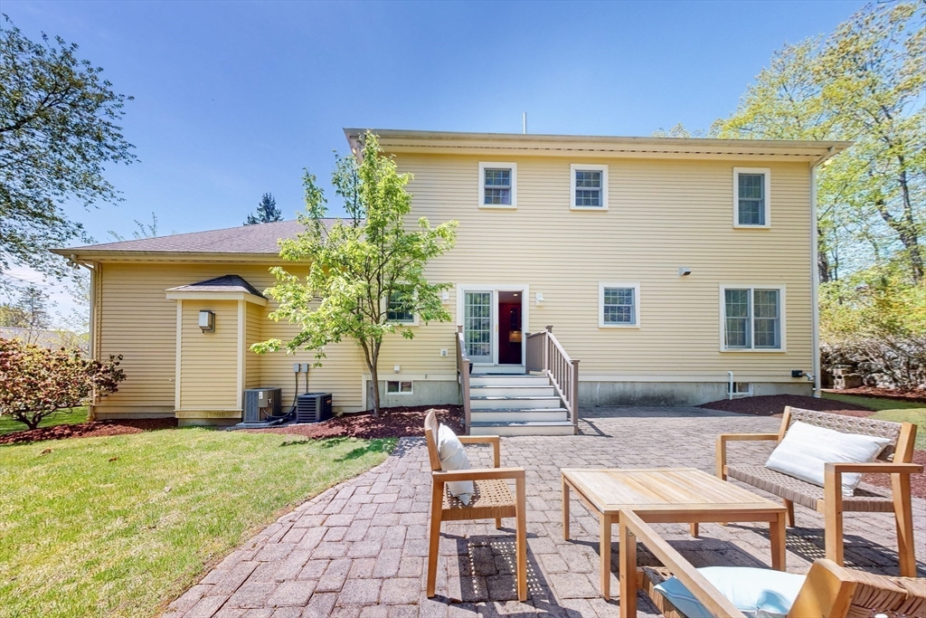 99 Ridge Street Winchester, MA 01890 - Photo 36 of 40 a view of a house with backyard and sitting area