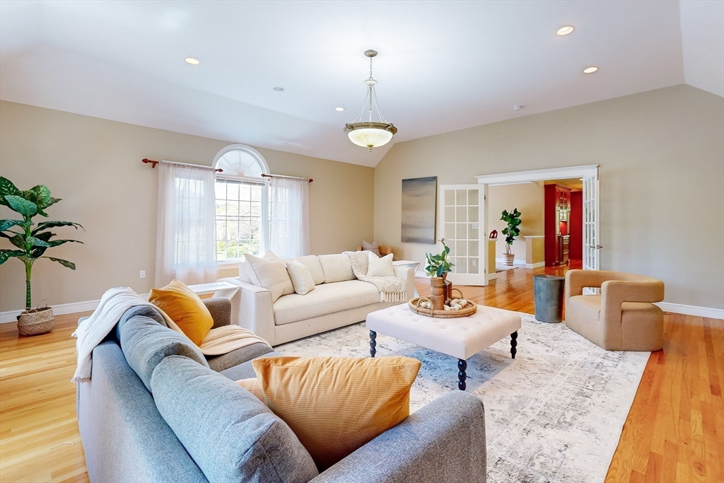 99 Ridge Street Winchester, MA 01890 - Photo 4 of 40 a living room with furniture potted plant and a window