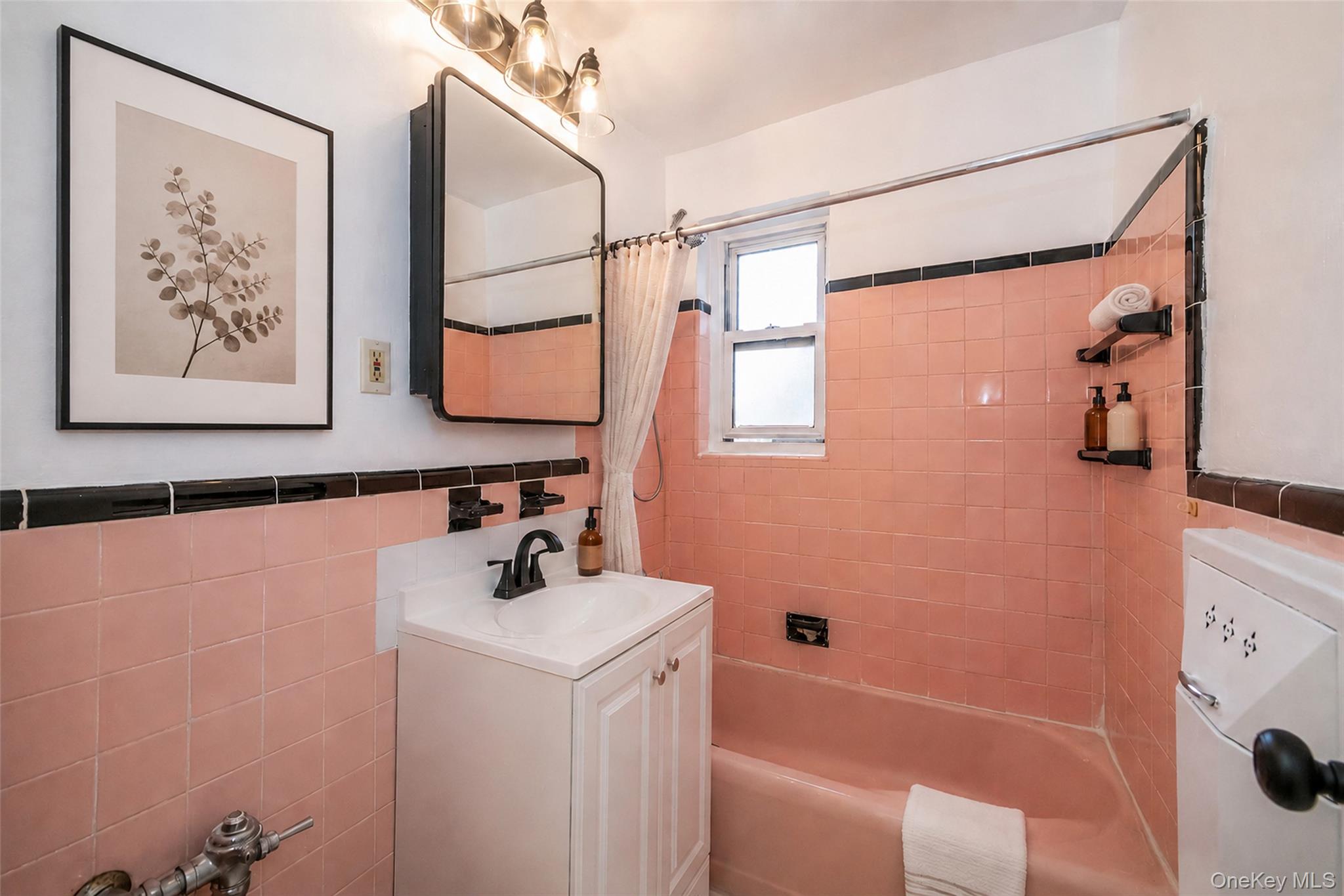 70 Locust Avenue, Unit B405 New Rochelle, NY 10801 - Photo 19 of 33 Updated bath with new vanity and mirror