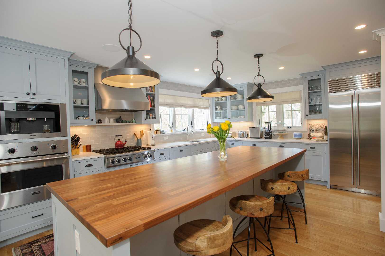 31 North Street Edgartown, MA 02539 - Photo 15 of 49 a kitchen with stainless steel appliances granite countertop a sink a stove and a wooden floors