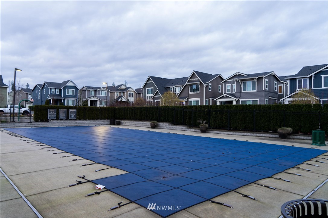 4419 185th Place Southeast Bothell, WA 98012 - Photo 5 of 7 a view of a houses with a terrace
