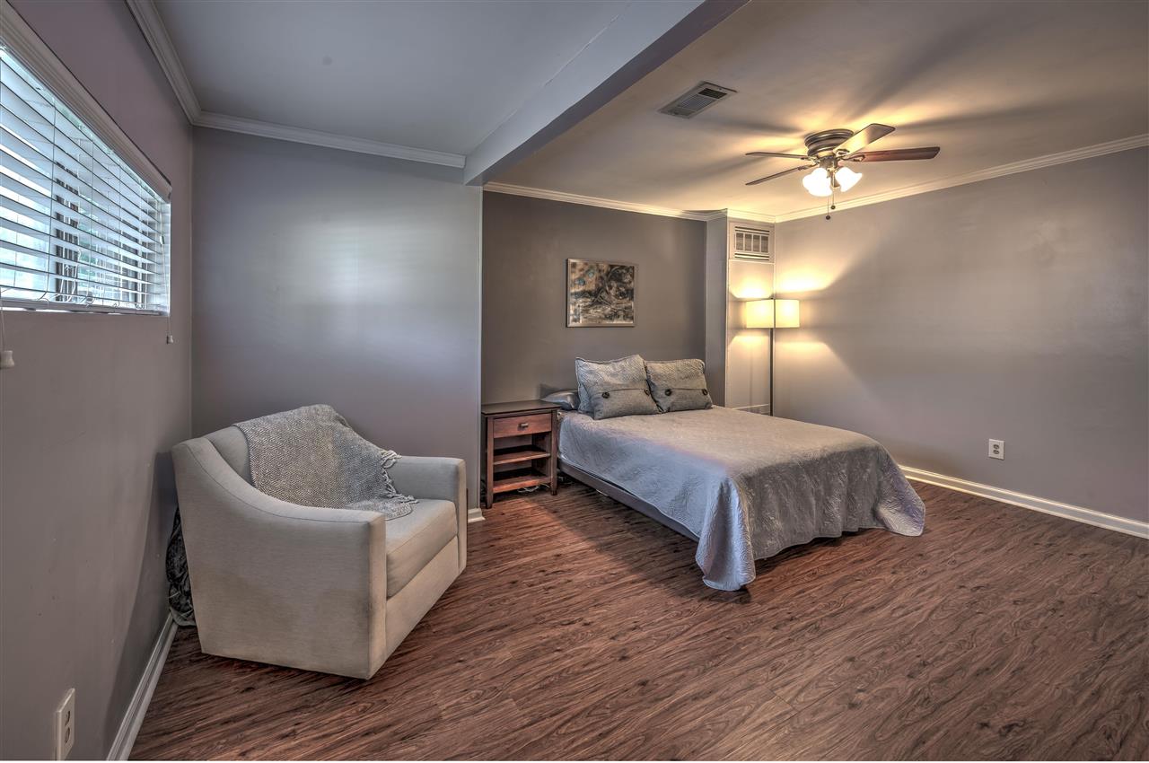 4680 Flamingo Road Memphis, TN 38117 - Photo 12 of 23 a bedroom with a bed and window
