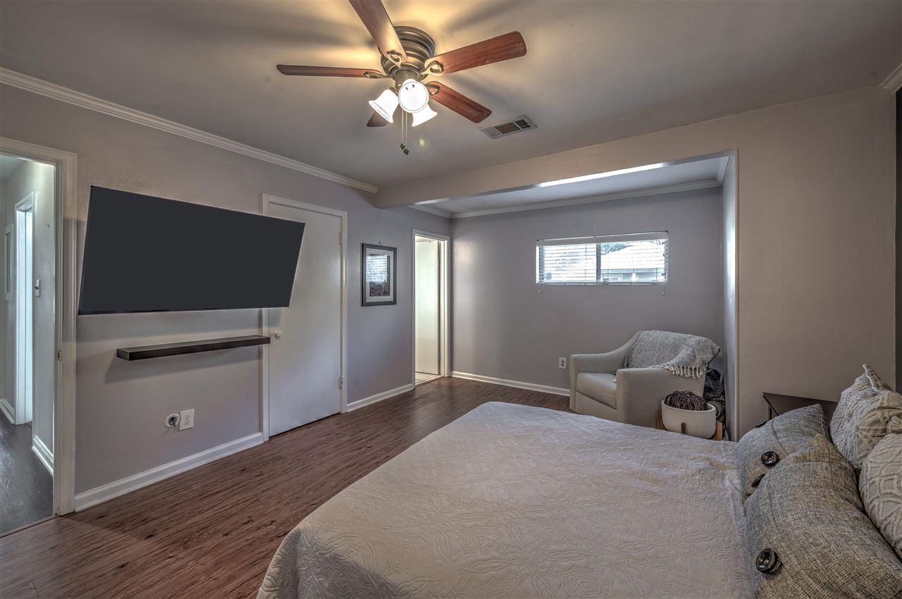 4680 Flamingo Road Memphis, TN 38117 - Photo 13 of 23 a bedroom with a bed and a flat screen tv