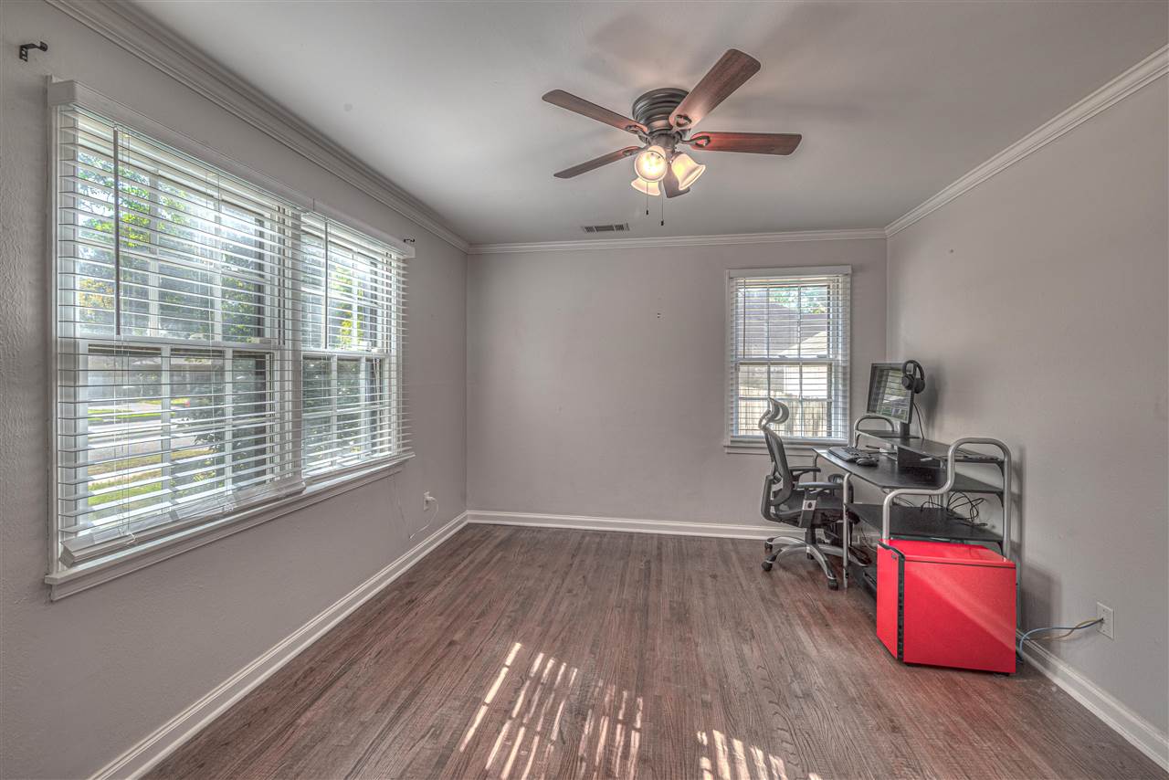 4680 Flamingo Road Memphis, TN 38117 - Photo 16 of 23 a view of a room with wooden floor furniture and windows