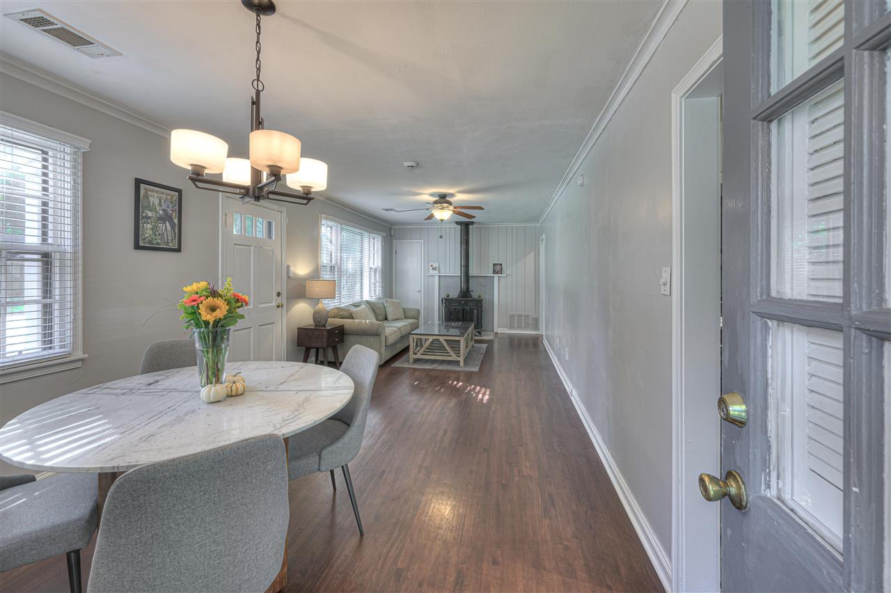 4680 Flamingo Road Memphis, TN 38117 - Photo 4 of 23 a view of a dining room with furniture wooden floor and chandelier