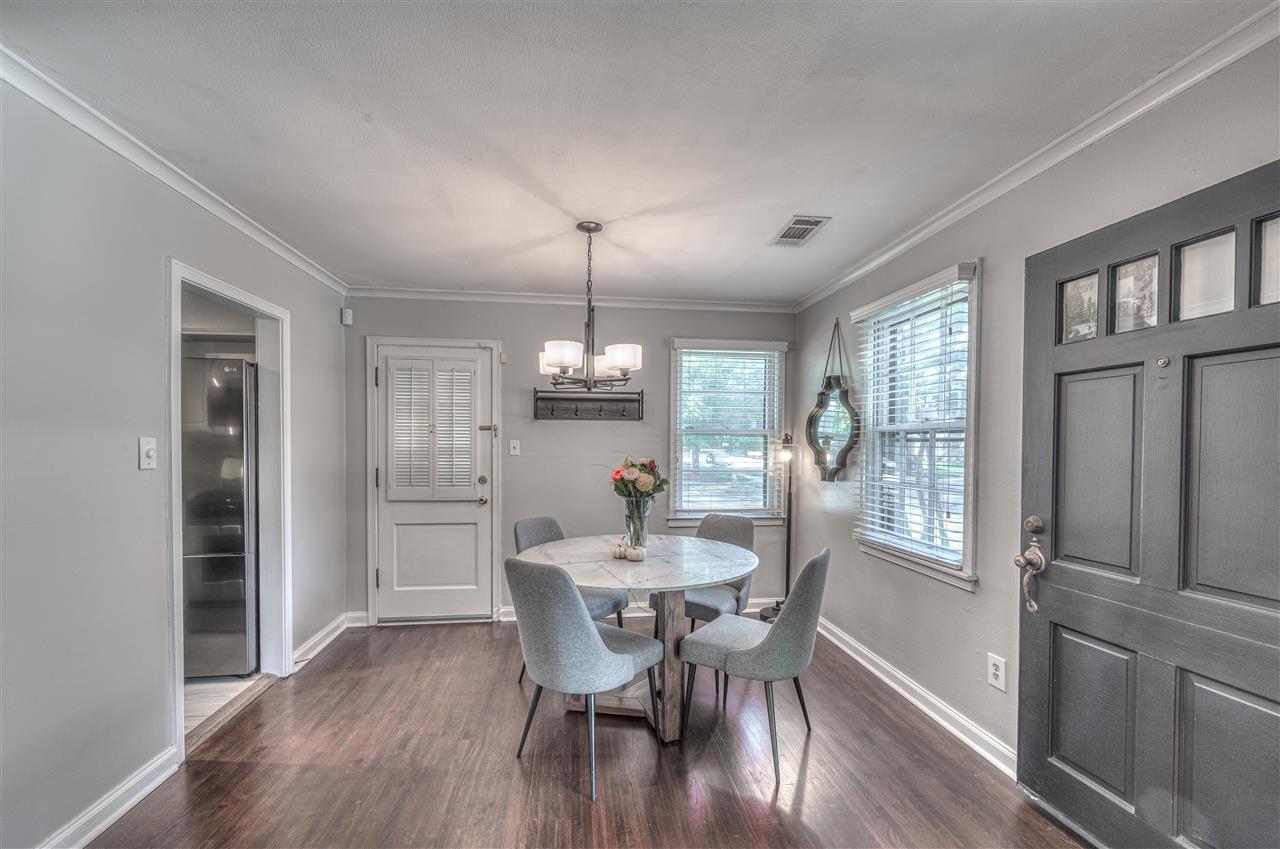 4680 Flamingo Road Memphis, TN 38117 - Photo 8 of 23 a view of a dining room with furniture window and wooden floor