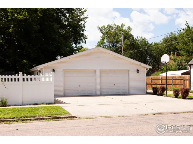 a view of a backyard of the house