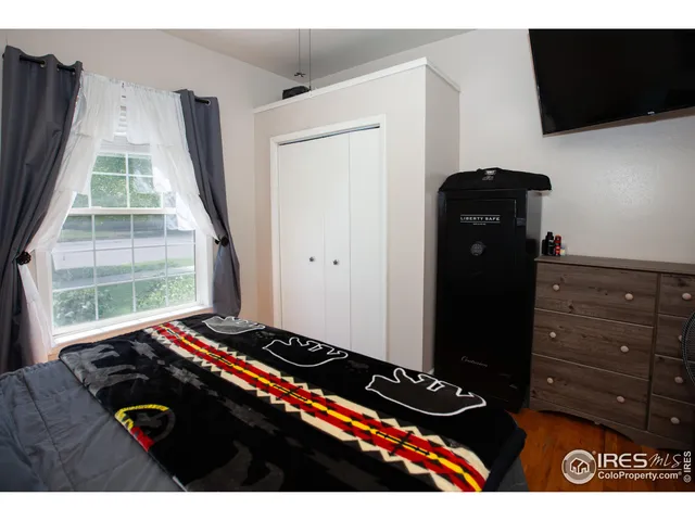 a bathroom with a sink a mirror and a toilet