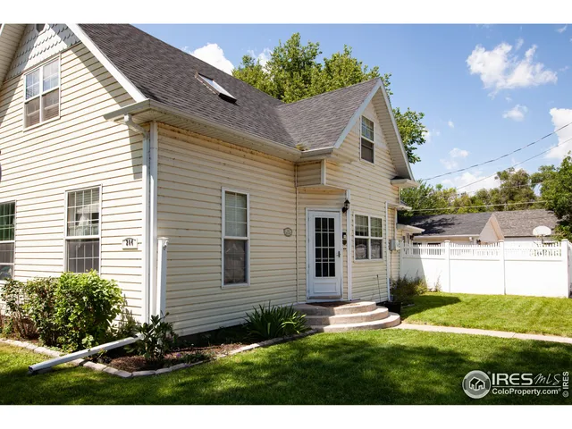 a view of outdoor space yard and front view of a house