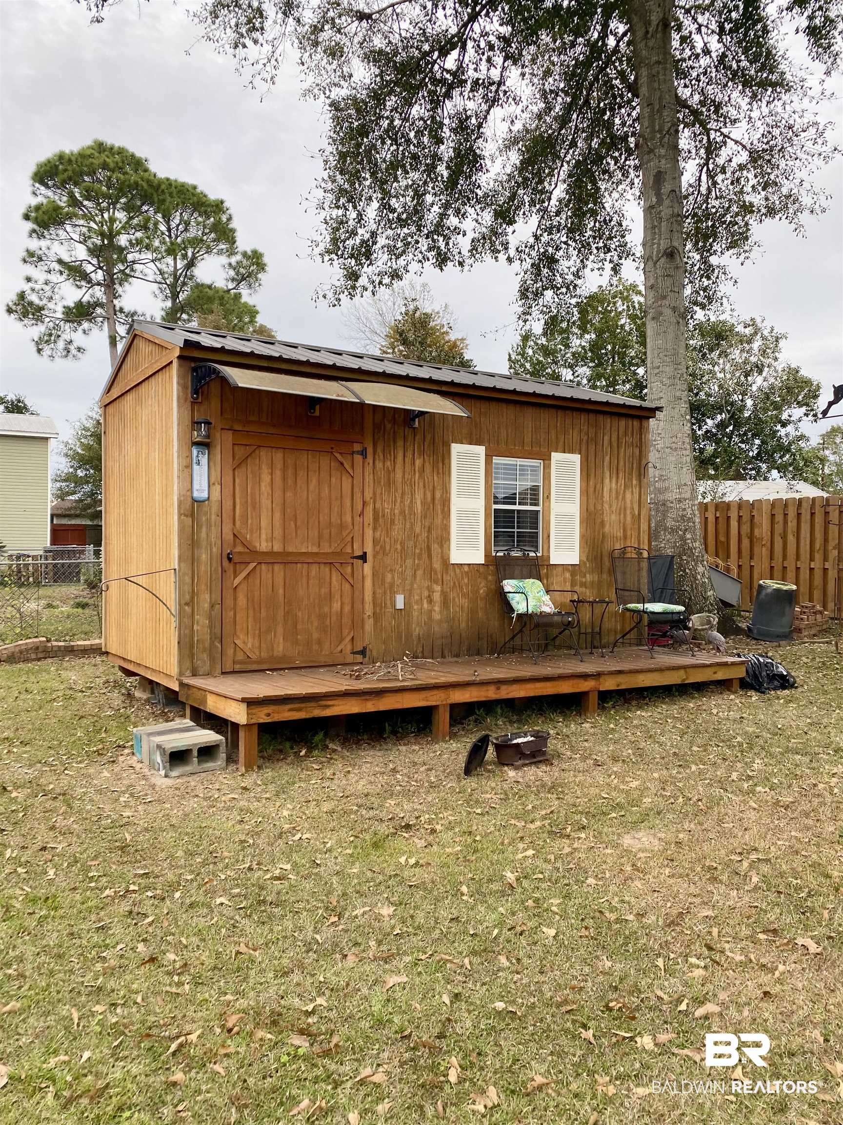 2872 Avenida Alberto Lillian, AL 36549 - Photo 6 of 31 View of outdoor structure with a lawn