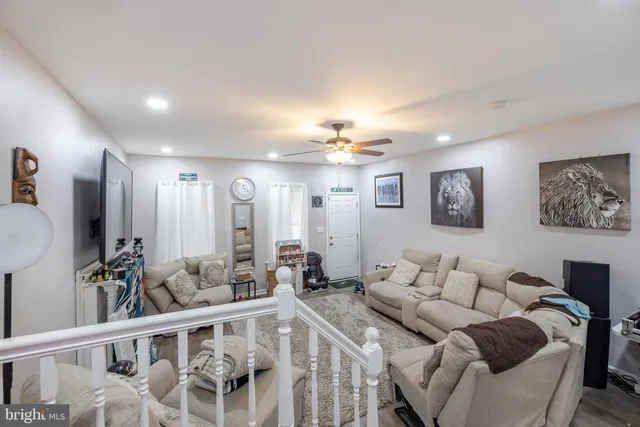a kitchen with a white stove top oven and white cabinets