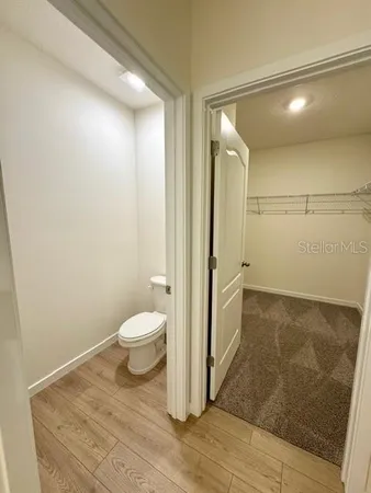 a view of a room with racks on the wall