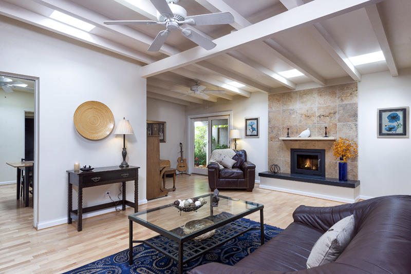 2123 Sycamore Canyon Road Montecito, CA 93108 - Photo 5 of 21 a living room with furniture a fireplace and a large window
