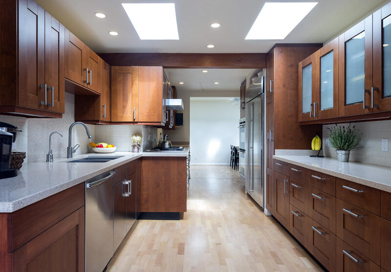 2123 Sycamore Canyon Road Montecito, CA 93108 - Photo 7 of 21 a large kitchen with stainless steel appliances wooden cabinets a stove and a sink