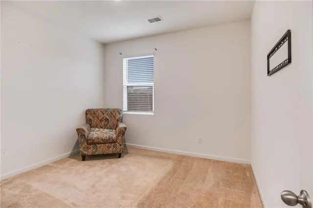 a room with furniture and a window