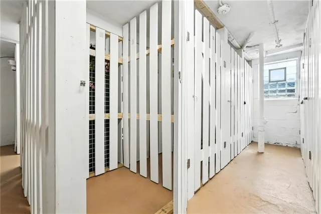 a view of a hallway with a bath tub