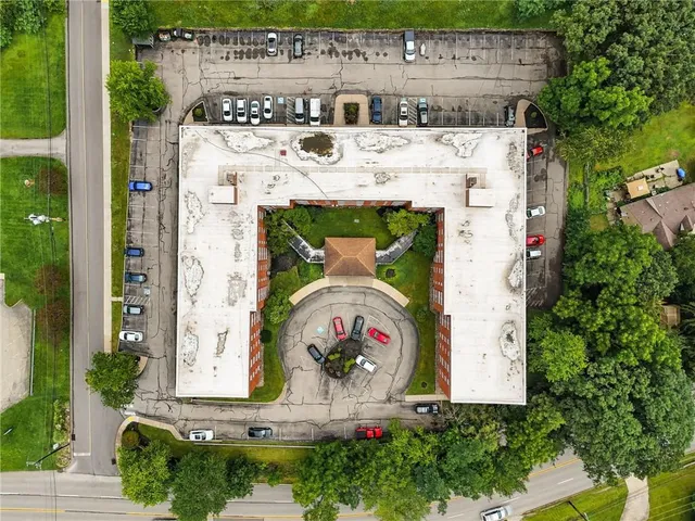 an aerial view of a fireplace with garden