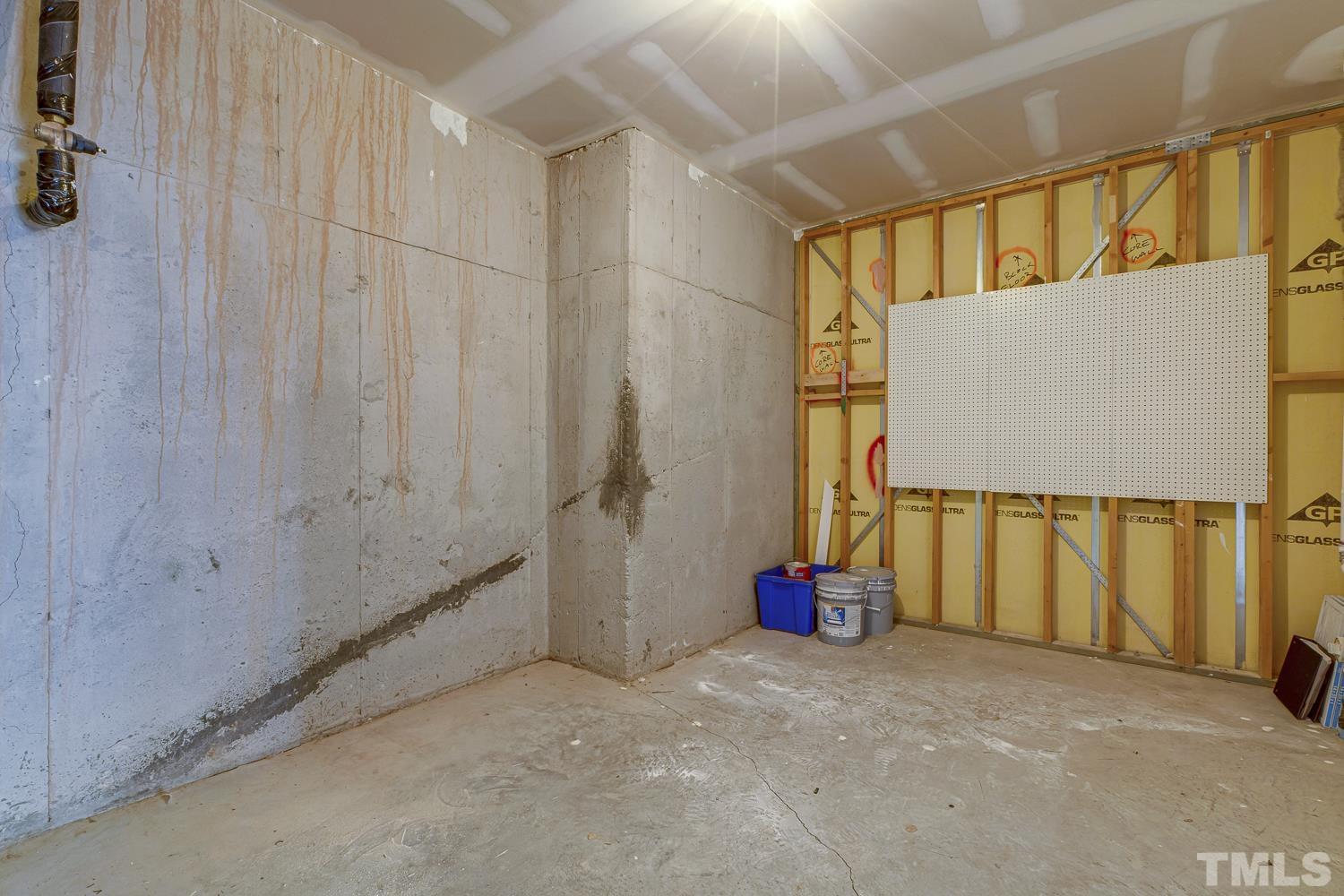 142 Cedar Elm Road Durham, NC 27713 - Photo 23 of 24 Unfinished storage area on lower level