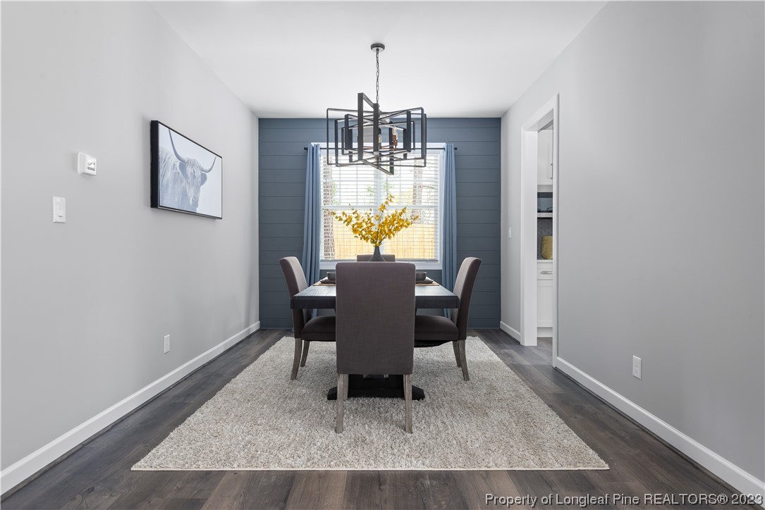 100 Sears Drive Cameron, NC 28326 - Photo 17 of 27 a view of a dining room with furniture window and outside view