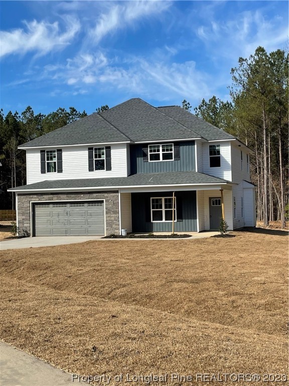 100 Sears Drive Cameron, NC 28326 - Photo 2 of 27 front view of a house with a yard