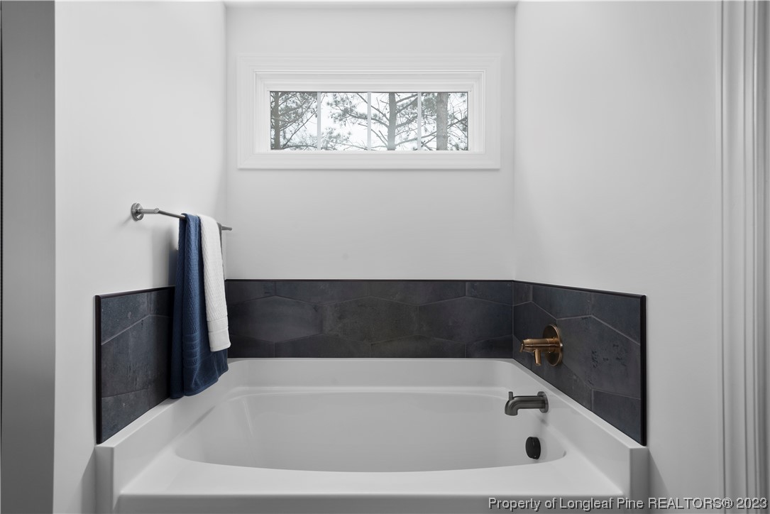 100 Sears Drive Cameron, NC 28326 - Photo 21 of 27 a bathroom with a bathtub