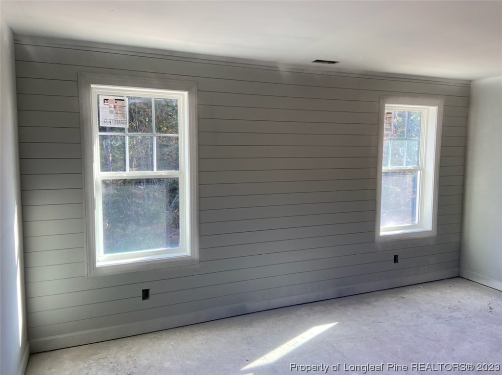 100 Sears Drive Cameron, NC 28326 - Photo 5 of 27 an empty room with windows